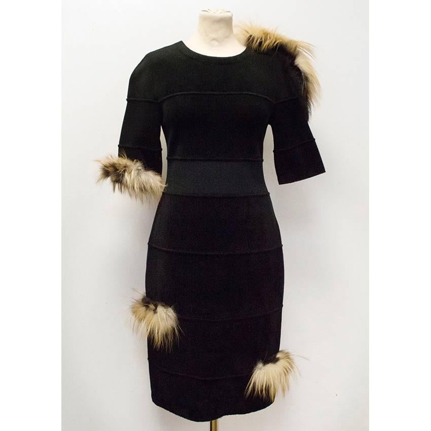 Fendi Black Dress with Silver Fox Fur.

The item features a round-neck, back zip fastening and fox fur detail.

The dress is new with tags and in excellent condition.

Condition: 10/10

66% Viscose, 2% Nylon, 7% Polyester, 1% Elastane.
Fur: Silver