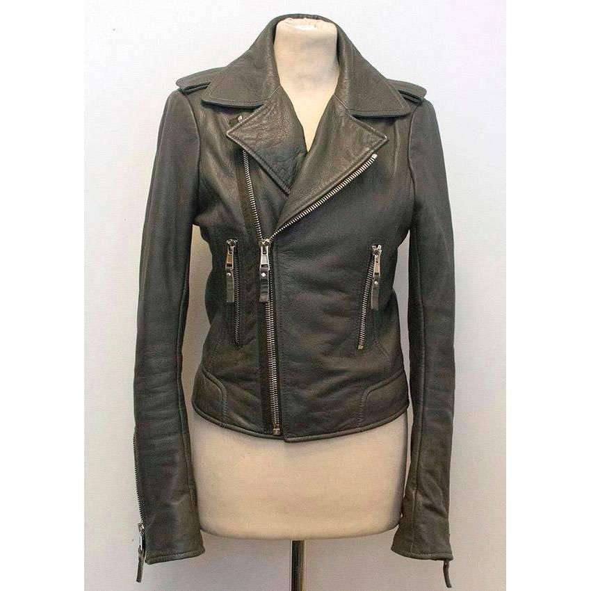 Grey lambskin leather biker jacket. Zip fastening at the front. Made in Turkey. Great condition, 9.5/10. 

This item belongs to Caroline Stanbury from 'Ladies of London'.

Size - 40 (FR)

Approx Measurements - 
Shoulders: 37cm
Sleeve length: