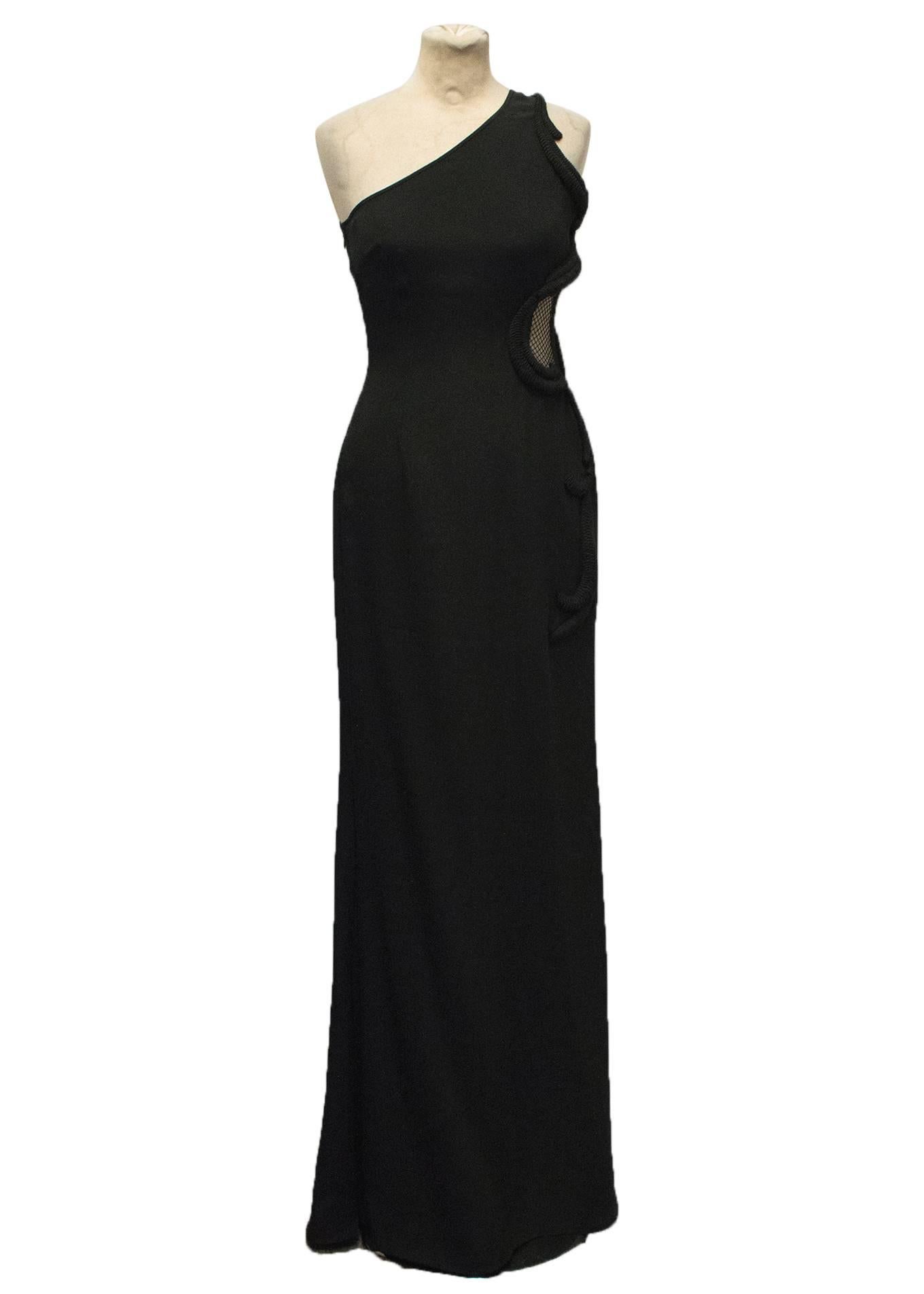 Stella McCartney black one shoulder sleeveless floor-length gown. The gown is fitted to the waist with a flowing skirt, mesh cut-out detail on the side and a rope embroidery trim to the side and shoulder. Size IT40/ US4

Made in Italy. Dry Clean