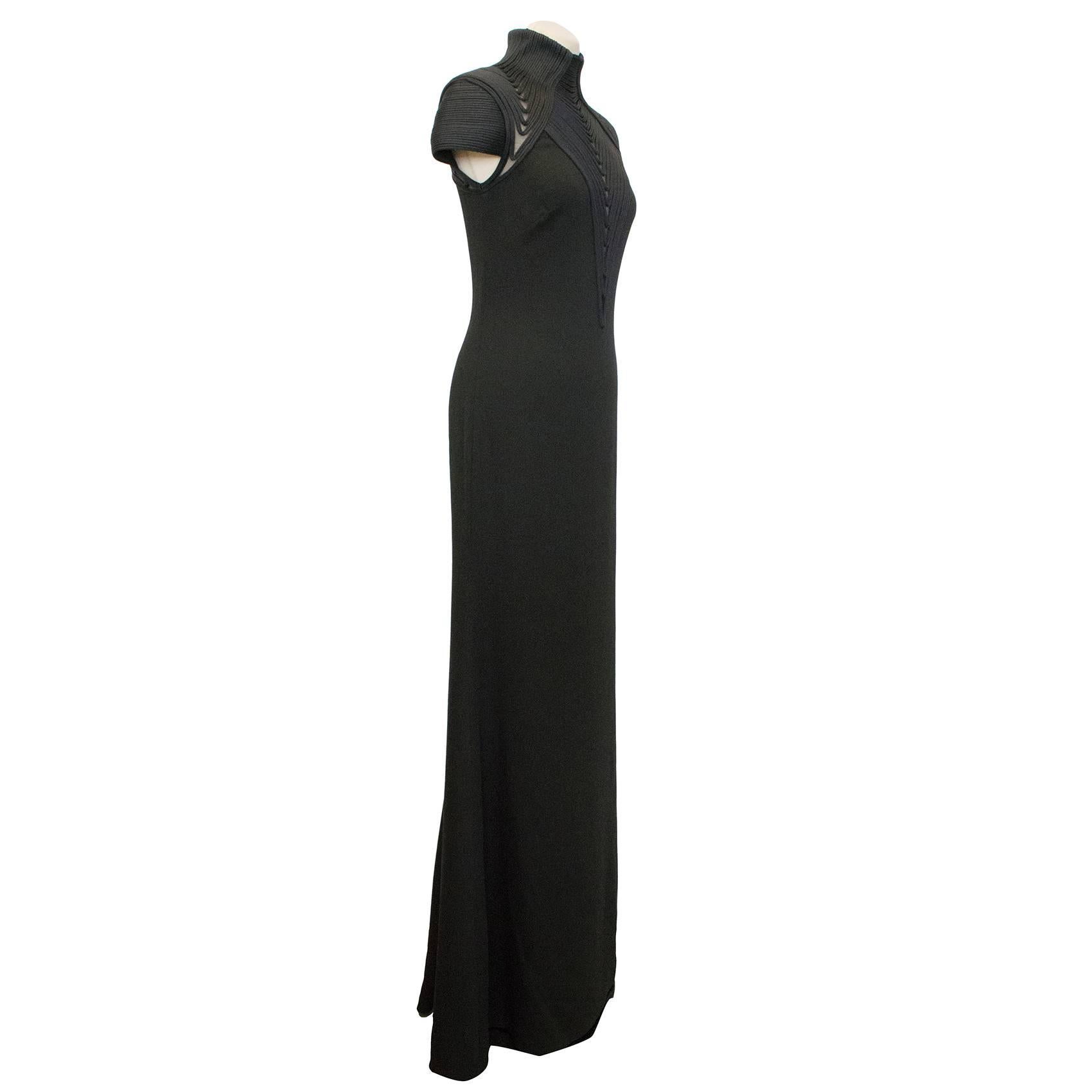 Ralph Lauren "Brita" black evening dress with rope embellishment around neckline and on cap sleeves. Medium weight fabric and soft to the touch, invisible back zip.

Sophisticated gown, designed with stretch silk cording and sheer tulle