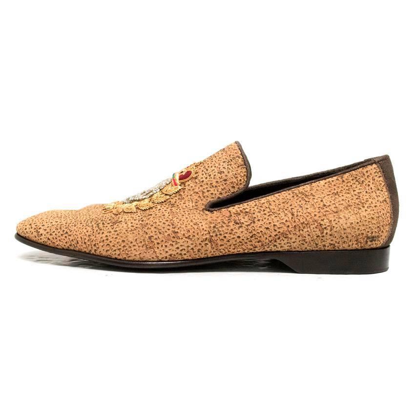 Donald J Milner tan/brown cork effect leather loafers with diamante skull detailing on the front of both shoes.

Shoes are in excellent condition, new and never worn, however there are some marks to the sole from storage. 

Condition: