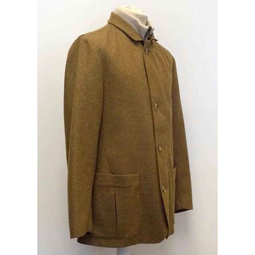 Loro Piana brown cashmere and goat hair jacket with detachable cream gilet. Made in Italy. Dry Clean Only. Zip Fastening. Excellent condition 9.5/10. 

Label size - M 
The seller usually wears an approx size XL / EU 52.

Approximate