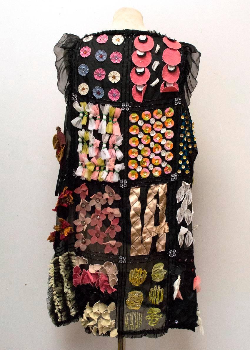 Dolce & Gabbana black sleeveless shift dress with colourful patchwork embellishments, slightly ruffled sleeves. One size

Perfect condition, 9/10

Lining  - 100% silk, Outer - 94% silk, 3% polyester, 2% linen, 1% cotton

Approximate