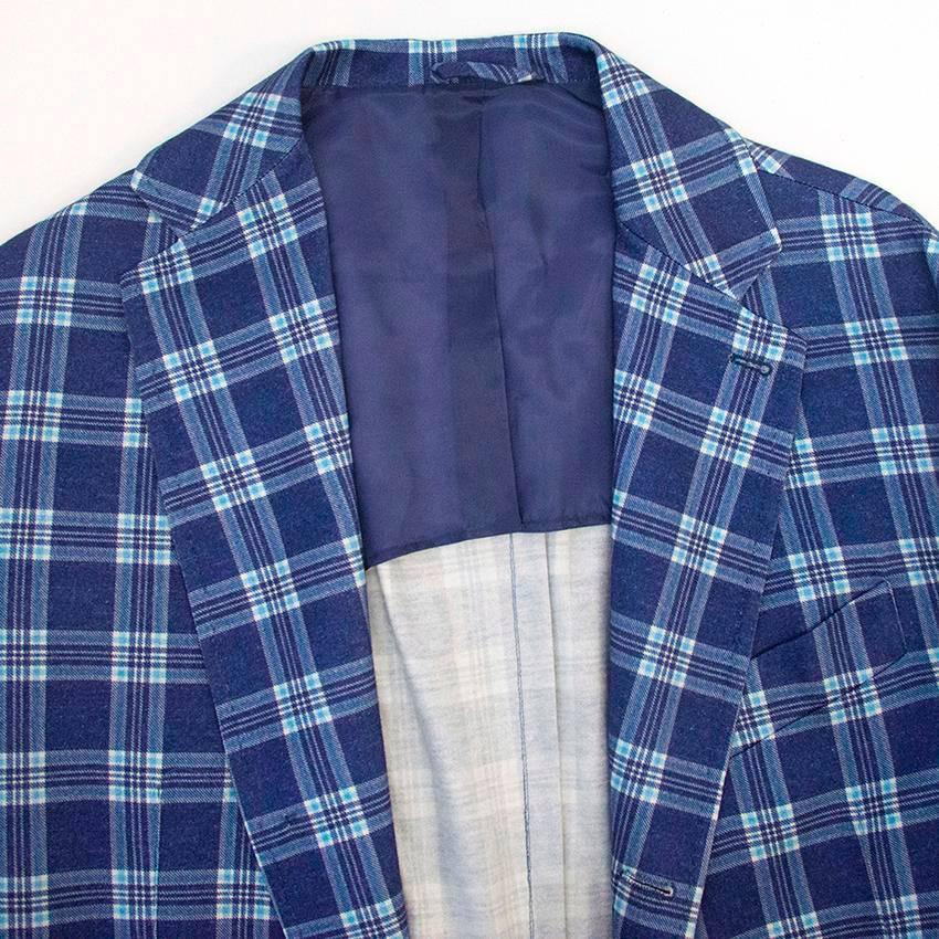 Light blue, navy and cream checked blazer. Made in Italy. Size EU 54

New without tags in perfect condition 9.5/10. 

Approximate measurements:
Sleeve - 68cm
Length - 82cm
Shoulders - 48cm
Chest - 55cm