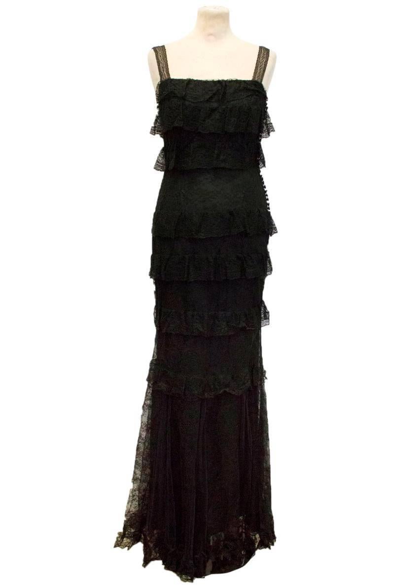 Christian Dior black lace maxi dress with lace frills around the dress. Slim fit dress with 3cm thick lace straps. Features a hidden side zip with black buttons going down the top of the zip. 

Size: FR 36, GB 8, IT 40, USA 4

Condition:
