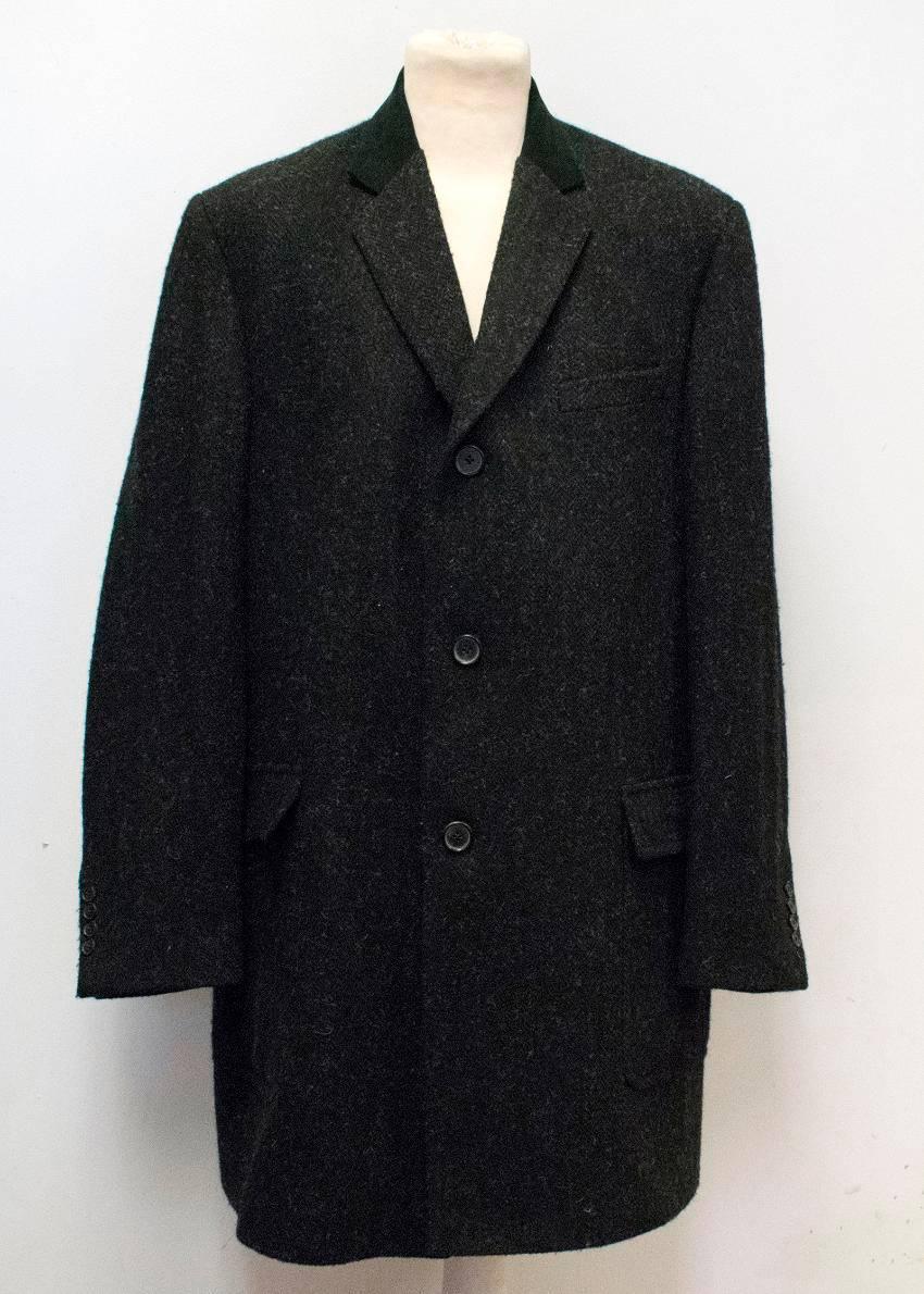 Margaret Howell dark grey wool overcoat. 
- 100% wool
- Wide notch lapel 
- Single breasted
- Double front pockets
- 100% cupro lining
- Size - Large

Condition: 9.5/10 despite slight mark on the collar of coat however, can only be seen with