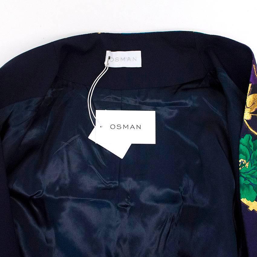 Purple linen blend raglan style coat with gold, green and blue floral print. Dry clean only. Perfect condition, 10/10. The coat has 3/4 length sleeves, is fully lined and has an oversized fit with no closure.

Please kindly note that this is a