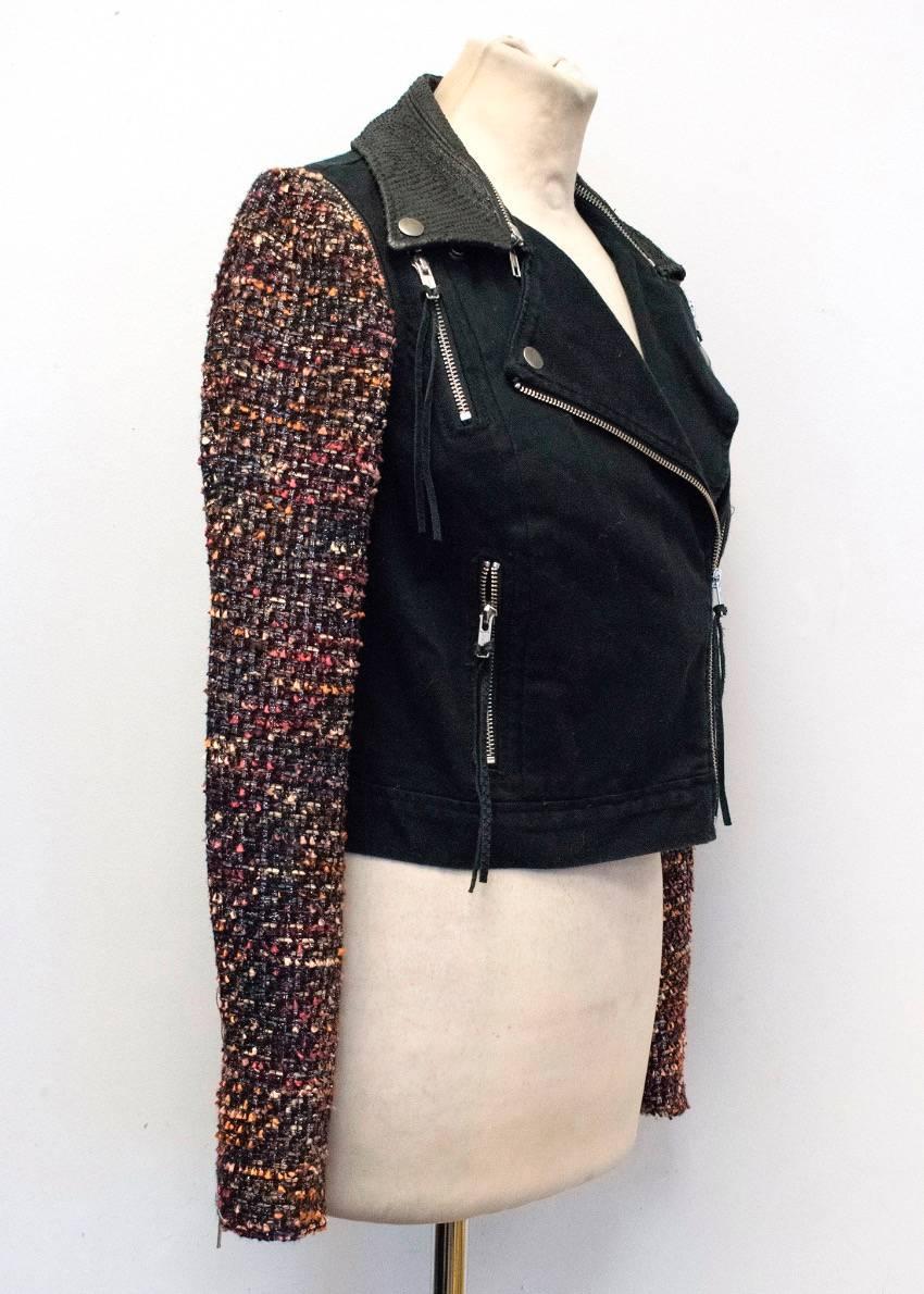 Elizabeth and James new 'Rory' biker jacket is made up of a black denim body, detachable boucle sleeves with shades of red, orange and brown as well as silver metallic accents. Features a detachable snake effect leather collar. It is a cropped fit