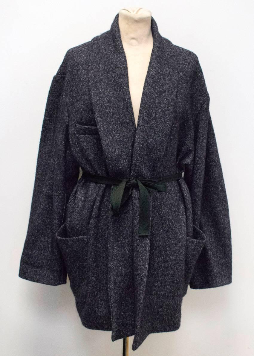 Isabel Marant Etoile 'Janelle' navy belted jacket with two front pockets and a single breast pocket. Comes with a simple black tie belt for the waist. 

Condition: 10/10

Approx measurements: 
Shoulders - 46cm 
Chest - 60cm 
Sleeve Length -