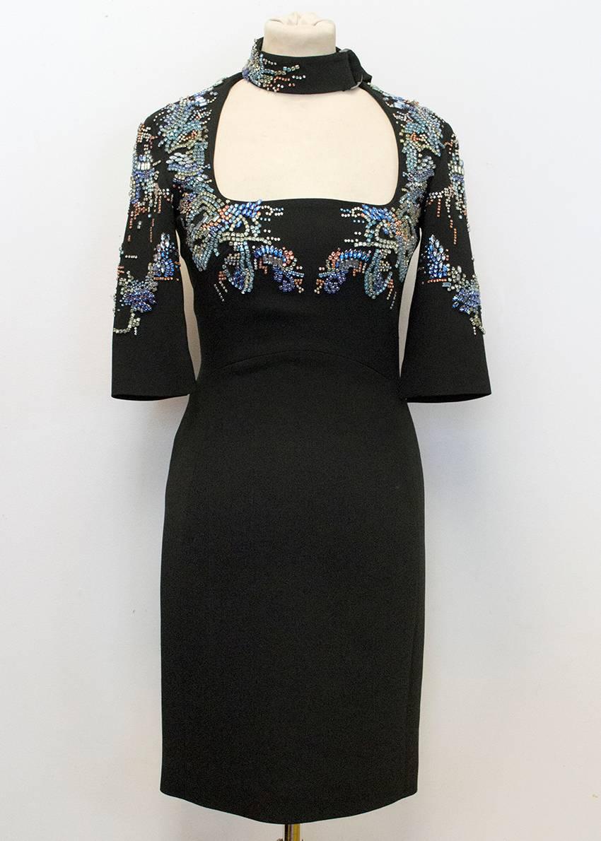 Antonio Berardi black dress with embellishments and back zip fastening. The dress features a embellished scarf.

Condition: New without tags. 10/10. 

Fabric: Viscose/ Acetate/ Spandex 

Length: 91 cm 
Bust: 40.5 cm 
Arm Length: 34 cm 
Waist: 31.5
