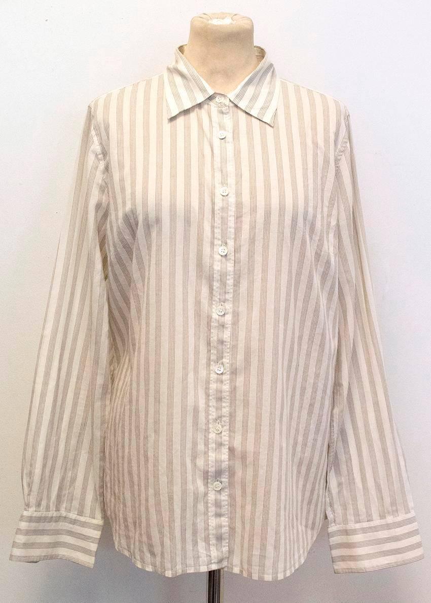 Long sleeved cream shirt with grey stripes. Button fastening. Made in China. Good condition, 8.5/10. Some marks on the inside of the shirt by the brand label - these are not visible when worn. Tiny mark by the hem on the left at the back. 

Fabric: