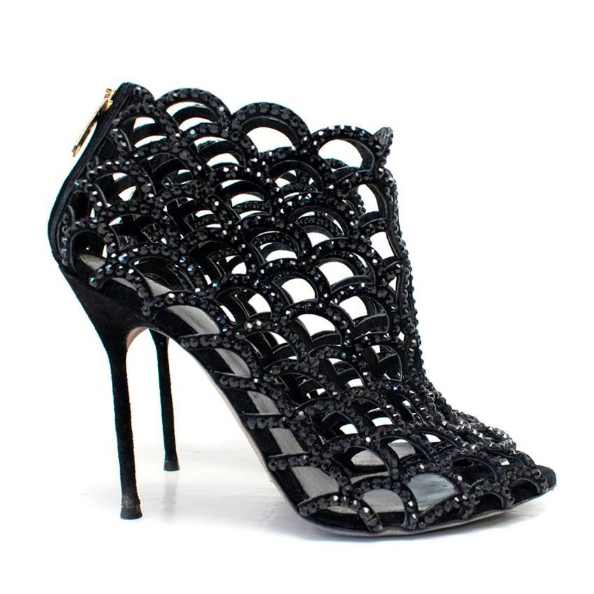 Sergio Rossi caged black heeled sandals. They have a short zip at the back and are embellished with black diamantes. 

Condition: 9.5/10
Marks on the sole from wearing.

Approx.
Heel: 10.5cm
Toe to hHel: 18.5cm
Width: 7.5cm
Height:18.5cm

Fabric: