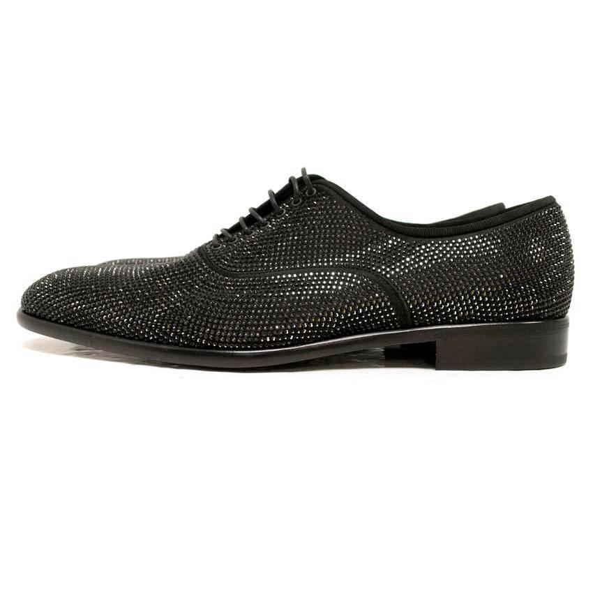 Salvatore Ferragamo black satin dress shoes covered in tiny black swarovski crystals.

Never worn and there are no defects, condition: 10/10 

Approx.
Length: 9.5cm
Width: 10cm
Toe to heel: 30.5cm

Fabric: Satin and rhinestone 

Size: EU 43, UK 9,