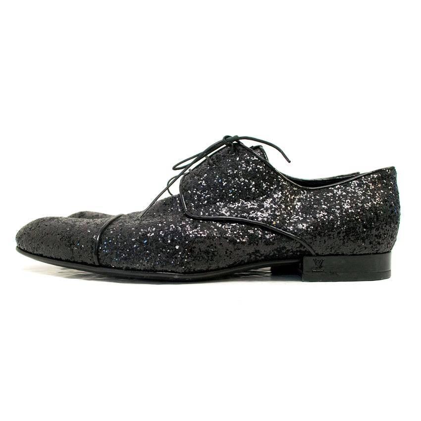 Louis Vuitton black fully glittered dress shoes with black laces and black sole. Louis Vuitton logo embossed in heel

Sole slightly worn out, but visible part of shoe is in excellent condition, 9/10

Due to the nature of the item, they will have to