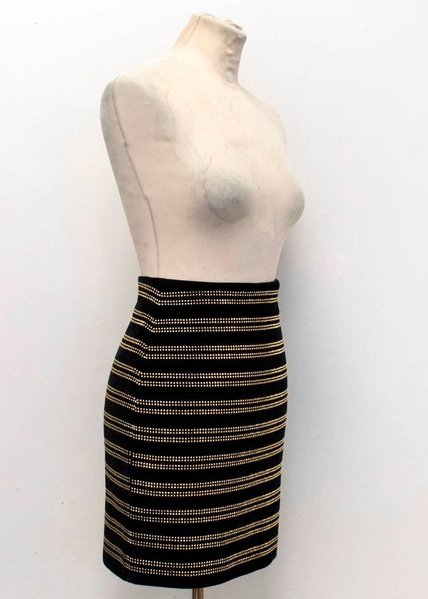 Balmain black, velvet mini skirt. The skirt features Glass Verre golden embellishments and a zip at the back.

Condition: 9.5/10

Size: XXS
Size UK: 6
Size US: 2

Measurements Approx:

Waist - 30cm
Hips - 40cm
Length - 42cm