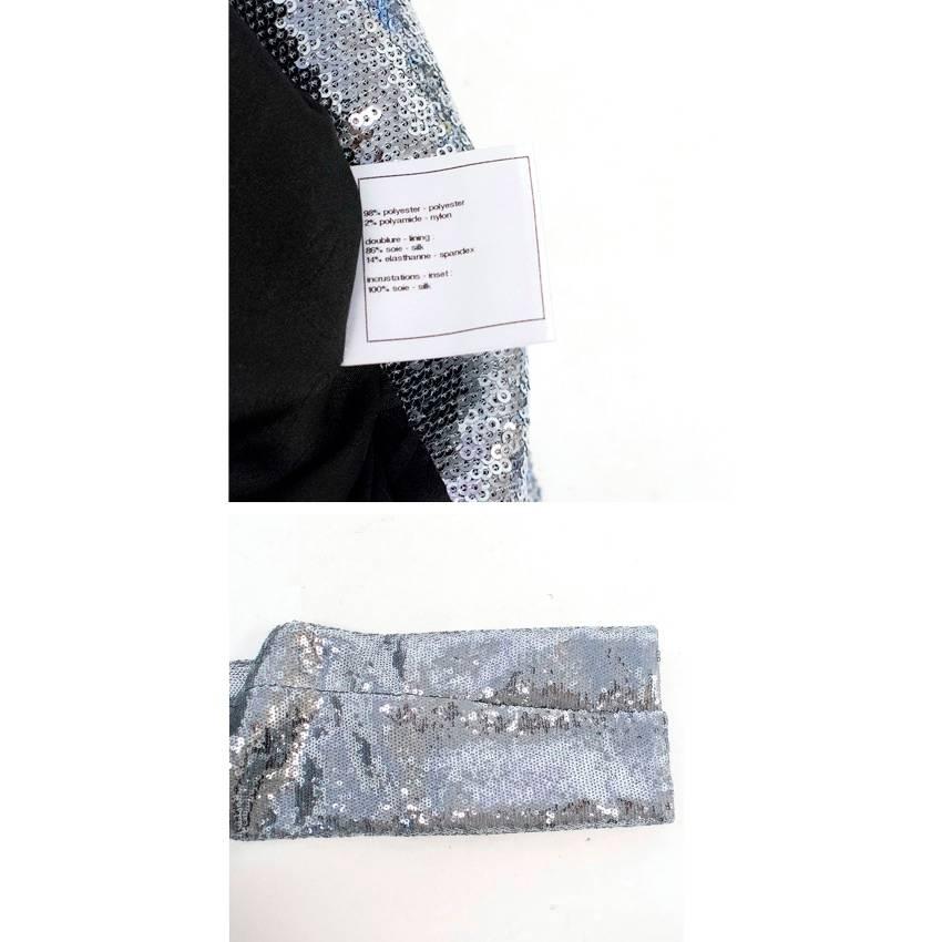 Chanel single-breasted, single buttoned jacket embellished with silver sequins. The blazer features a peak lapel, two pockets at the front waist, one breast pocket and slits on the cuffs. The blazer is fully lined.

Condition: 9.5/10

Size: M
Size