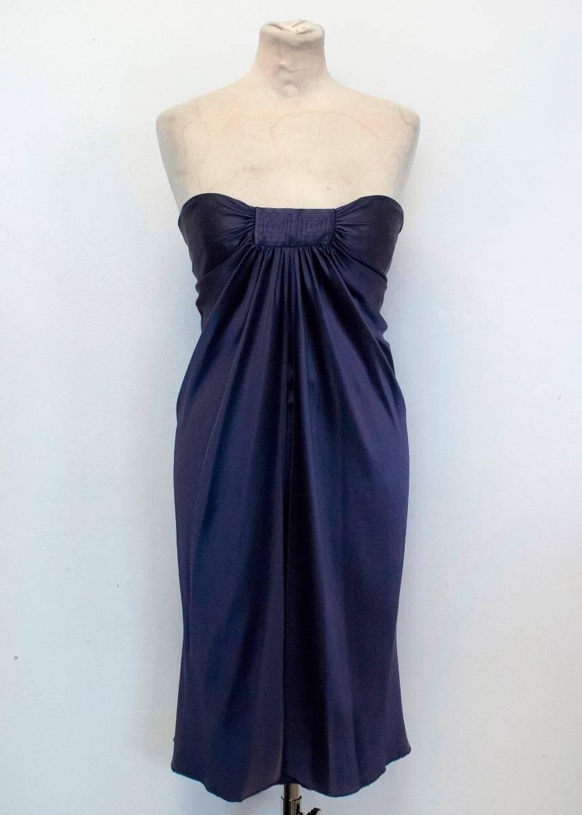 Amanda Wakeley purple, silk, strapless short dress. The dress has a boning on the top, zip and fasteners at the back.

Condition: 10/10 

Size: XS
Size UK: 8
Size US: 4

Measurements Approx:

Bust - 32cm
Waist - 29cm
Hips - 35cm
Length - 72cm