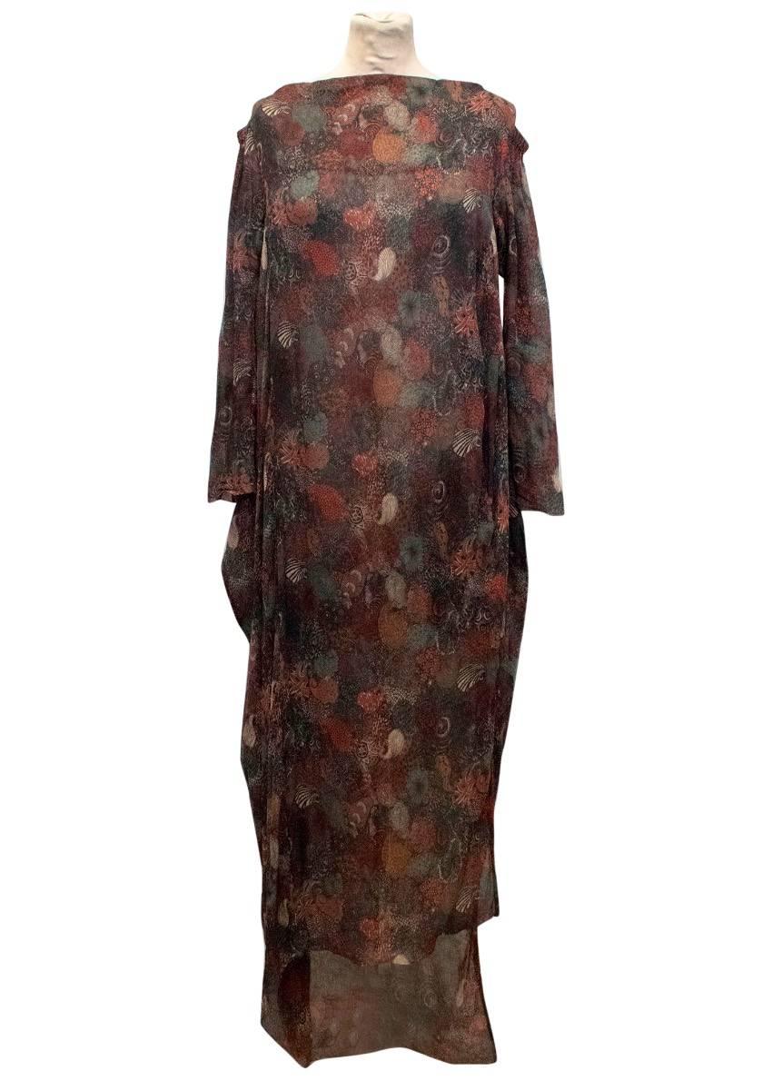 Vivienne Westwood flowy, sheer, silk dress which falls just above the ankle. It features a multicoloured paisley print and cold shoulder detailing.

Condition: 9.5/10

Size: S
Size UK: 10
Size US: 6

Measurements Approx:
Shoulders: 48 cm
Sleeves: 50