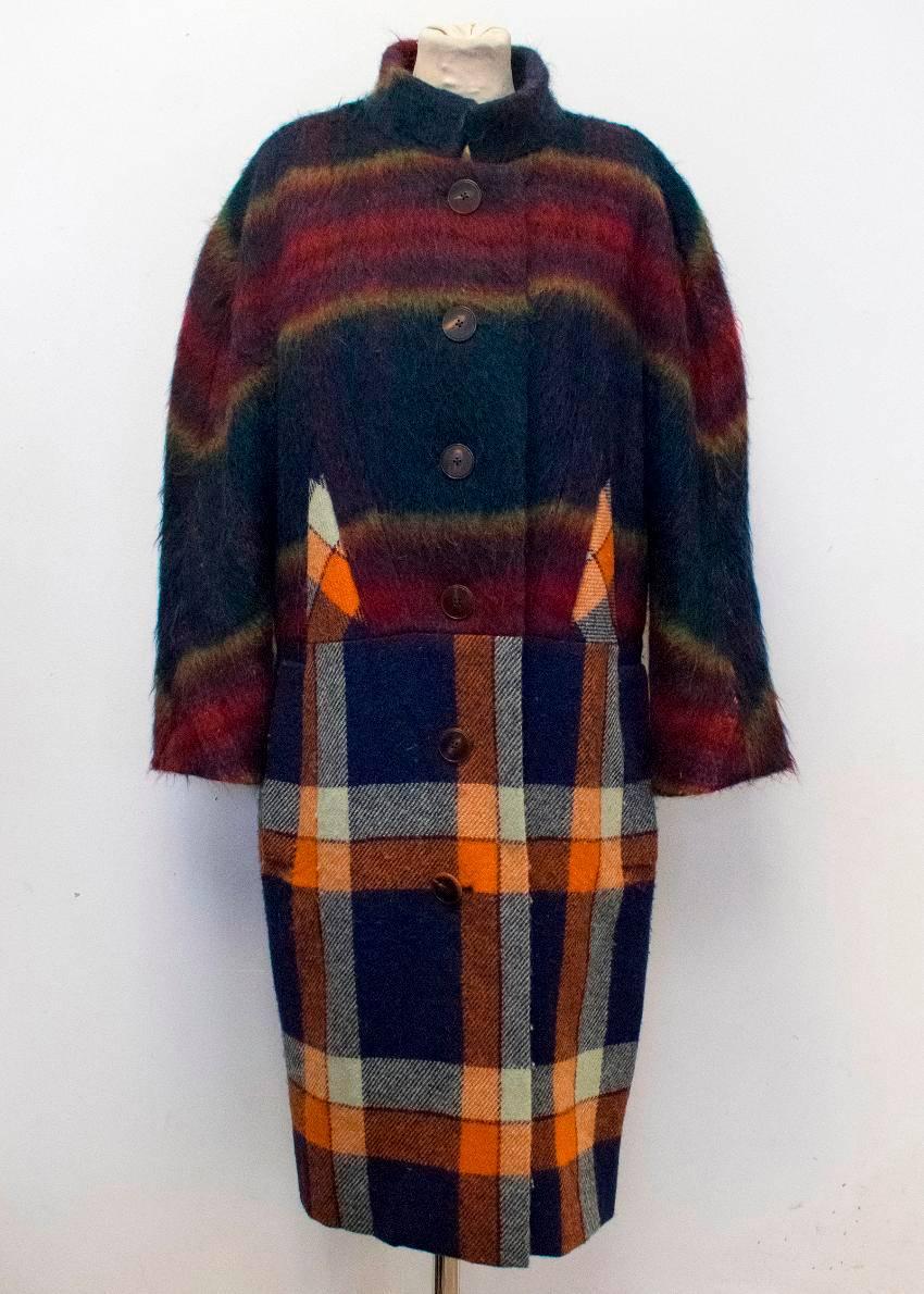Vivienne Westwood hand woven oversized multicoloured textured tartan coat with a banded collar, two exterior pockets and tortoise shell buttons at the front. 
Fully lined with patterned acetate, cotton blend. 

Condition:10/10

Size: XS
Size UK: