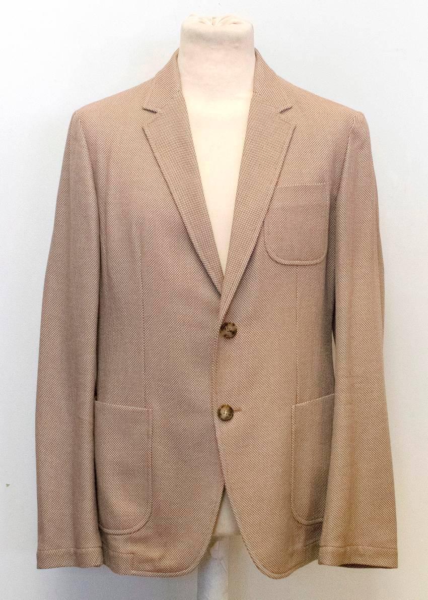Alexander McQueen brown tweed, relaxed fit jacket with a notch lapel, three exterior pockets and a vent at the back. 
The blazer is partially lined and fastens with two tortoise shell buttons at the front. 

Condition: 9.5/10 

Size: M
Size UK:
