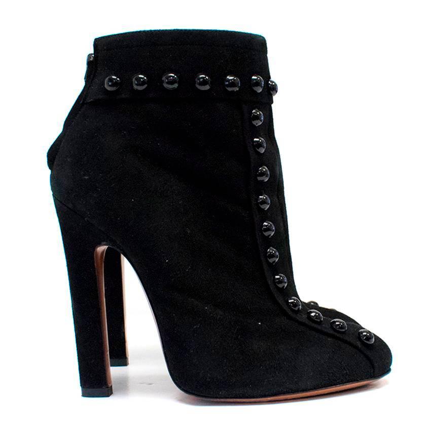 Alaia high heeled, black suede ankle boots with black studs and rounded toes. 
Fasten at the back with a zip.

There are minor signs of wear to the exterior.
Condition:9/10 

Size IT: 39
Size UK: 6
Size US: 9

Measurements Approx.

length: 27