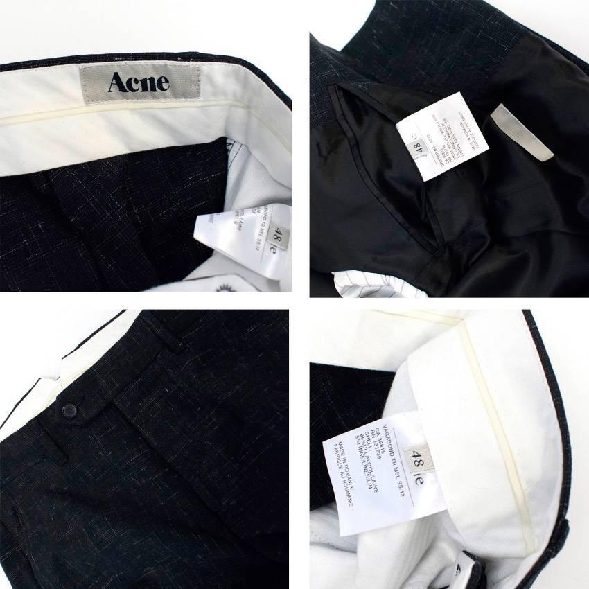 Acne navy blue, wool blend jacket and trousers with white thread detailing. The jacket features 2 vents in the back, shoulder pads, notch lapel a diagonal chest pocket in addition to two pockets at the front.

Condition: 9.5/10

Size: M
Size UK: