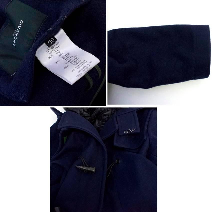Givenchy men's navy wool duffle coat with a hood. Features two exterior and two interior pockets.
The hood is lined with a detachable quilted polyamide insert. Fastens at the front with wood effect, dark brown toggle buttons. 

Condition:10/10