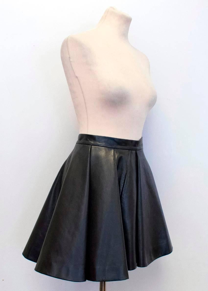 Balmain black lambskin leather short skater skirt. 
The skirt is medium weight and high waisted.
Fastens at the back with a silver toned metal zip and a concealed metal hook.
The skirt is fully lined with a black cotton and viscose blend fabric.