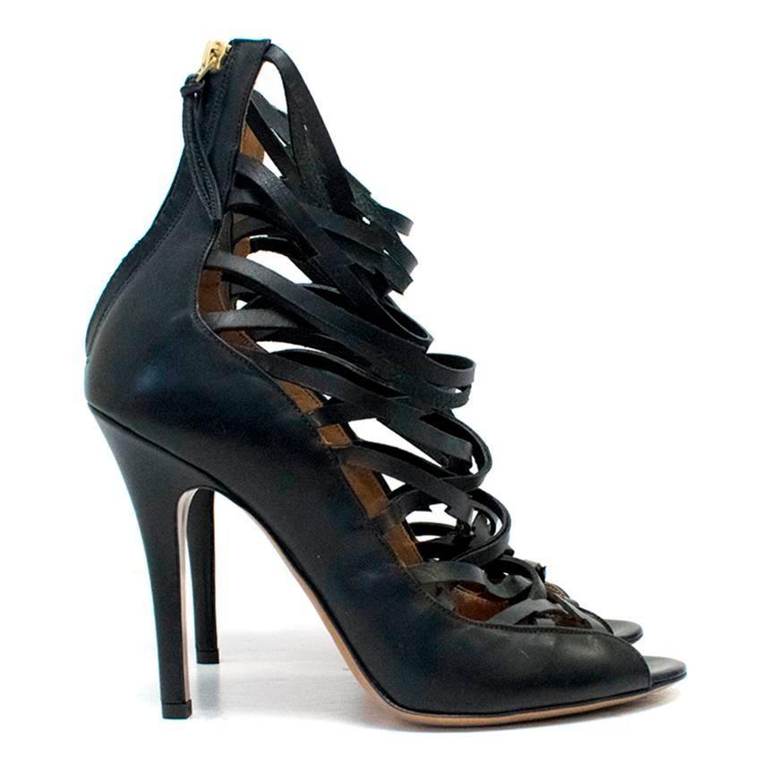 Isabel Marant 'Paw' black leather heeled sandals featuring criss cross lace up detailing from the toe to the ankle and tan insoles and soles.

Condition: 10/10

Size IT: 38
Size UK: 5
Size US: 8

Measurements Approx:
Total Height: 24 cm
Heel Height: