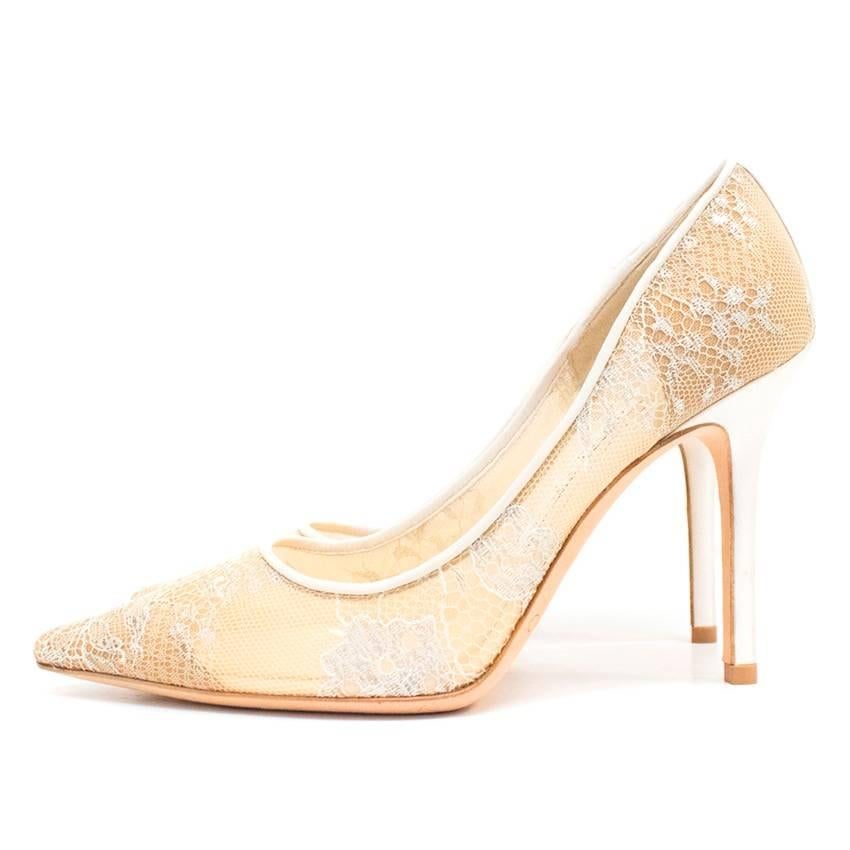 Jimmy Choo White Abel 90 Lace Point Toe Pumps. Features, pointed toe, stiletto heel, embroidered silver and nude lace details on upper and Lacquered heel. Lined in leather. 

Condition: 10/10

Size IT: 35
Size UK: 2
Size US: 5

Measurements