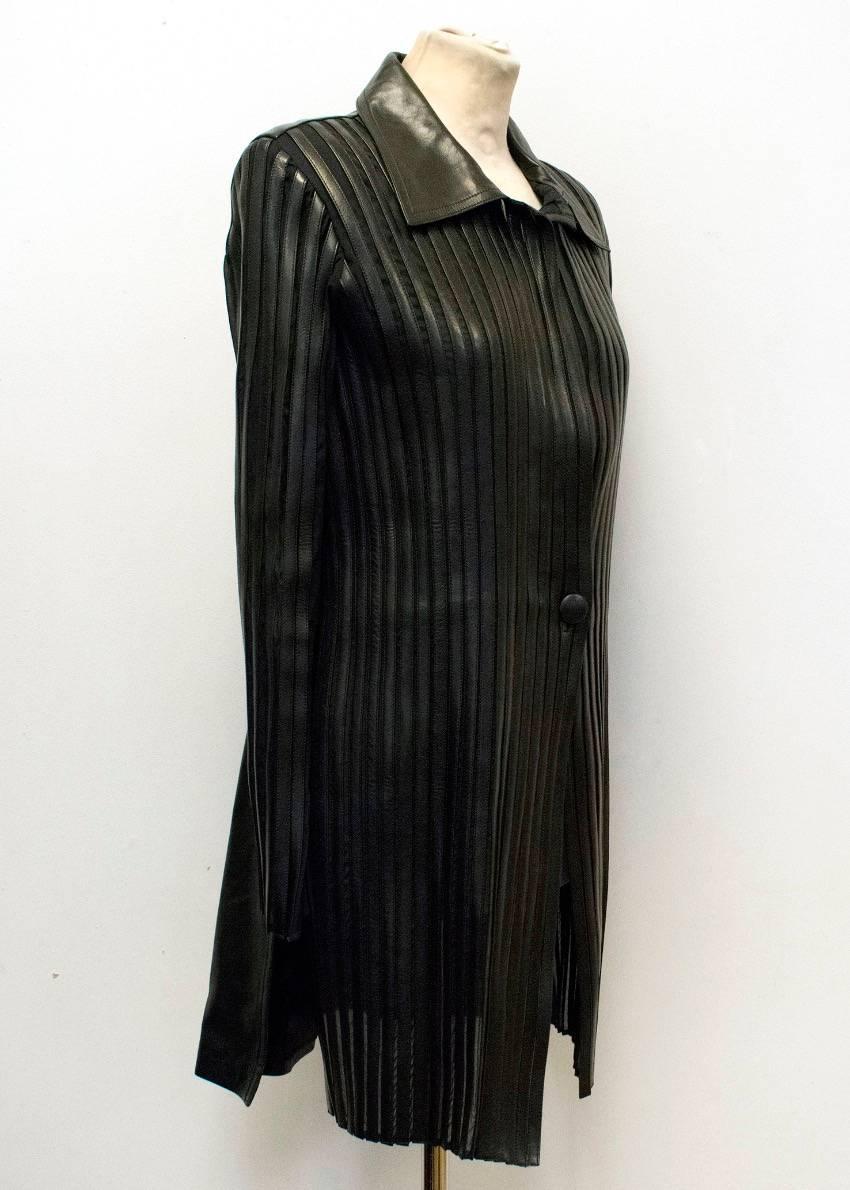 Jitrois long black leather jacket with sheer and leather striped panelling to the front and the sleeves. Wide spread collar and single leather button closure. 

Condition: 9.5/10 

Minor marks to the leather. 

Size: M
Size EU: 44
Size UK: 12
Size