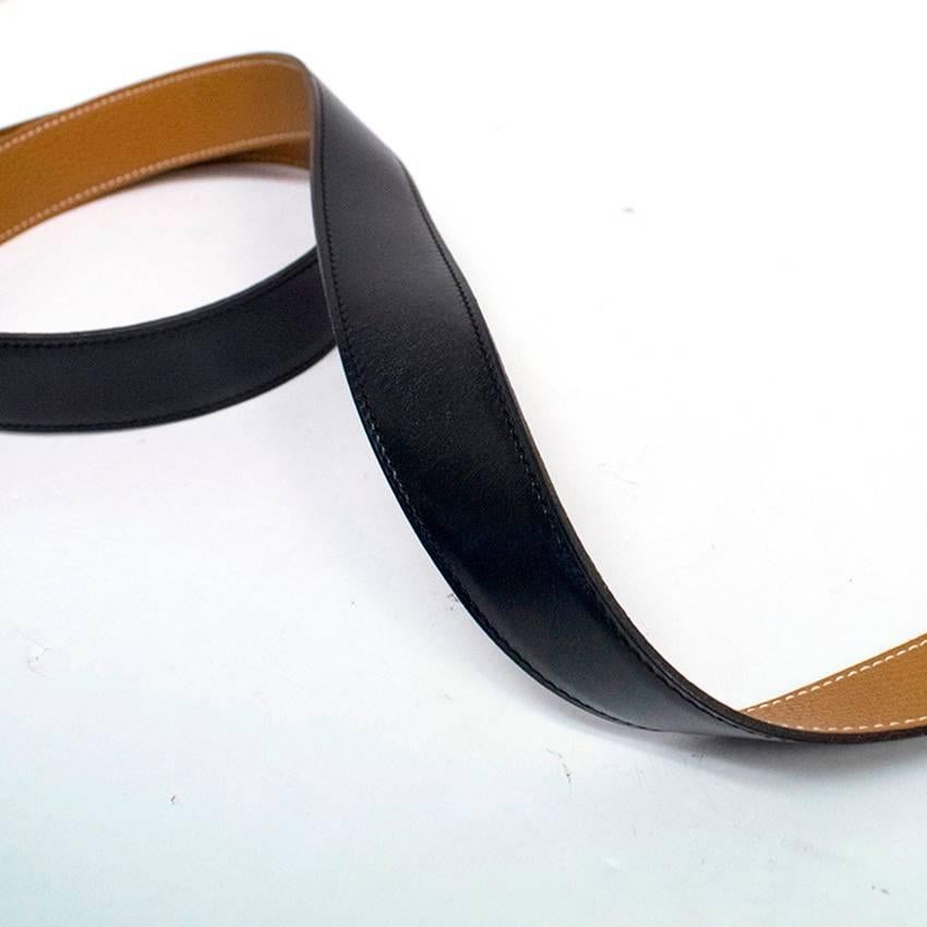 Hermes mens reversible black and tan leather belt. Features silver tone hardware H buckle. 

There is light tarnish to the hardware, otherwise in great condition.

Condition: 9.5/10

Measurements Approx.

Length: 124cm
Width: 3cm