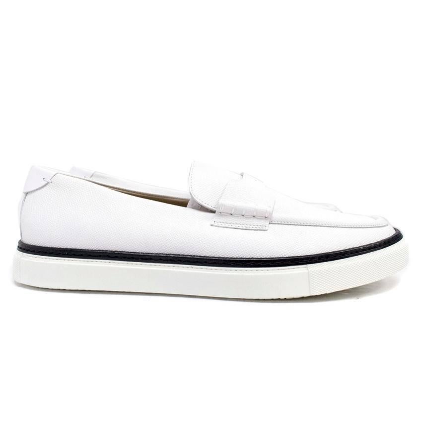 Hermes white loafers with rubber soles and black rim detail. Features the H tab attached to the front of shoe.

Condition 10/10

Size IT: 44
Size UK: 10
Size US: 11

Measurements Approx:
Length -32cm
Width -11.5cm 
Height -9cm 
