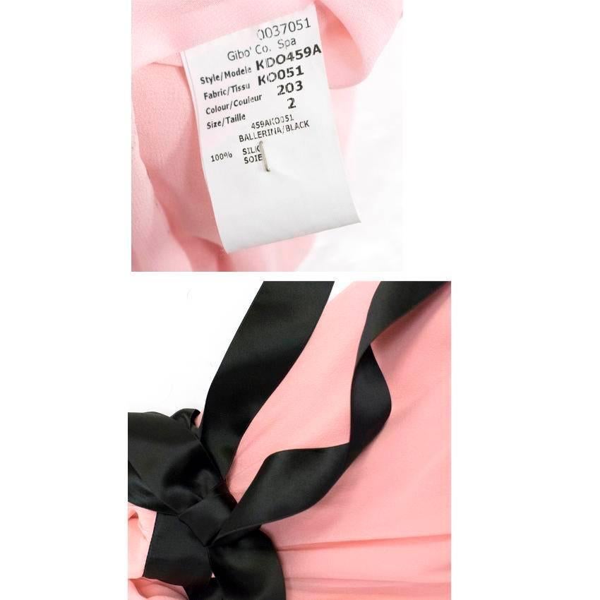 Michael Kors pink ribbon mini dress in layered silk chiffon featuring a black ribbon sash that sits under the bust featuring a deep v at the neckline and back.

Condition: 9.5/10. Minor signs of wear.

Size US: 2
Size UK: 6
Size IT: 38
Size FR: