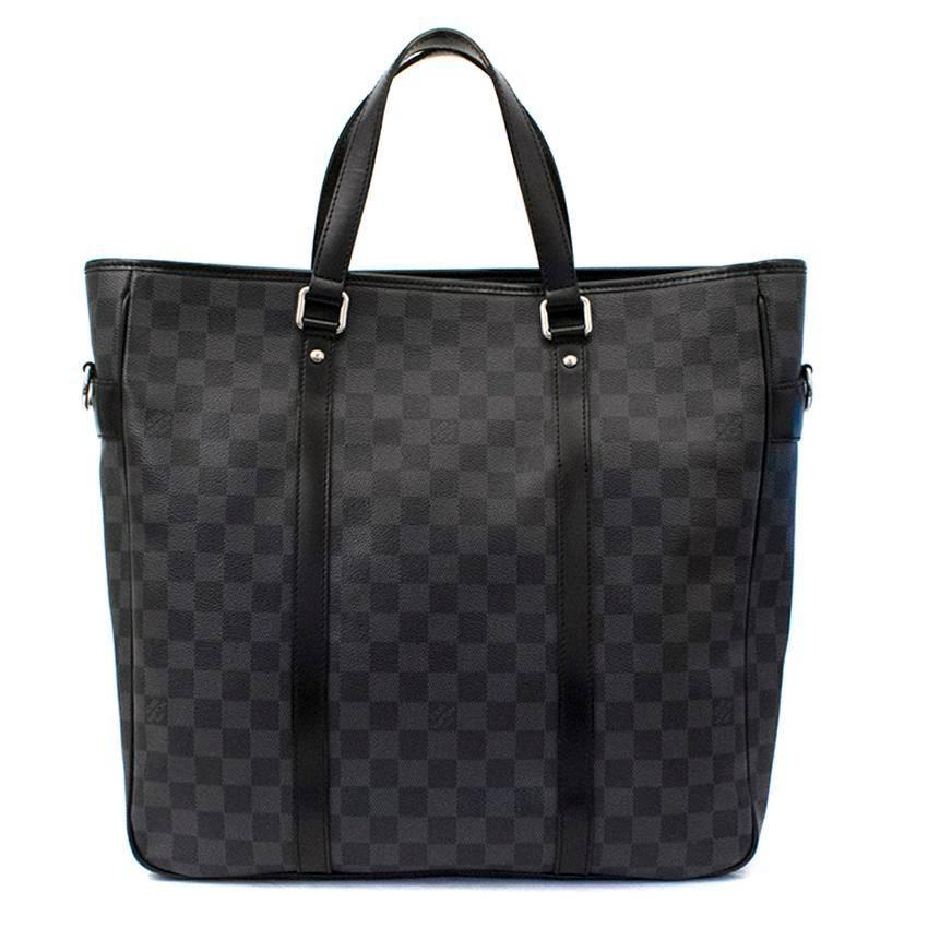 Louis Vuitton men's damier graphite canvas bag. Made in France, this item has silver tone hardware and zip closure. It also features a detachable and adjustable canvas strap, with three functioning pockets on the interior. Please note, these items