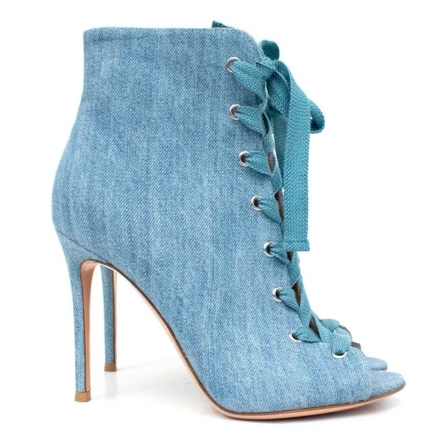 Gianvito Rossi lace-up denim ankle boots. 

Stonewash boots featuring peep toe and stiletto heel. Made in Italy. 

This item belongs to Caroline Stanbury of 