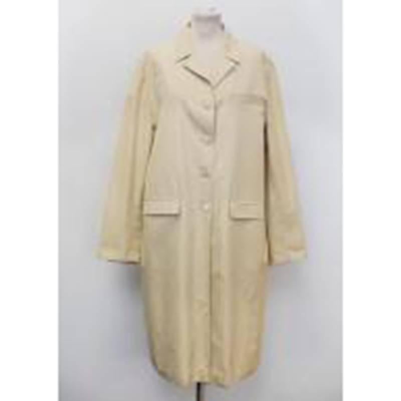 A lightweight coat featuring front button closure and three functioning pockets. Made in Italy. 

Conditions Details : Condition - 9/10. Minor mark near breast pocket and hip seam. Refer to images.

Size: L. US10, IT46
Approx: Bust: 56cm Sleeve