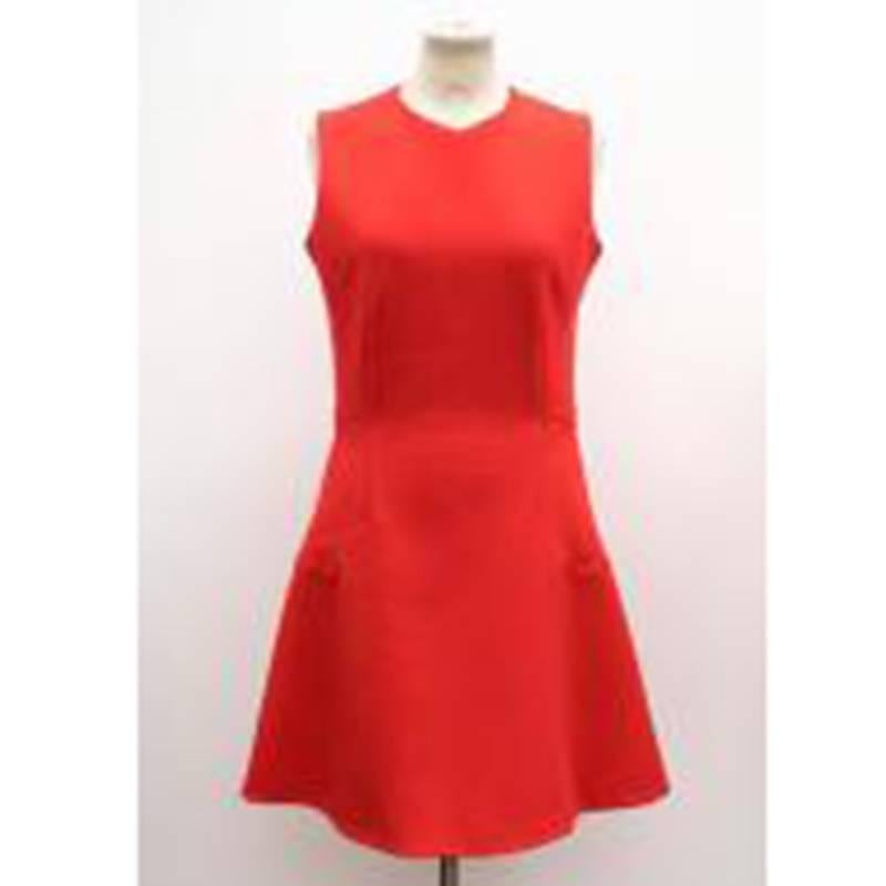Victoria Beckham red sleeveless dress in a fit and flare mini style featuring a slight v-neck design.

Size: S, US6, UK10
Measurements	: Approx. Shoulder: 34cm Bust: 41cm Waist: 35cm Length: 
91cm

Condition: 10/10

* Please note, these items are
