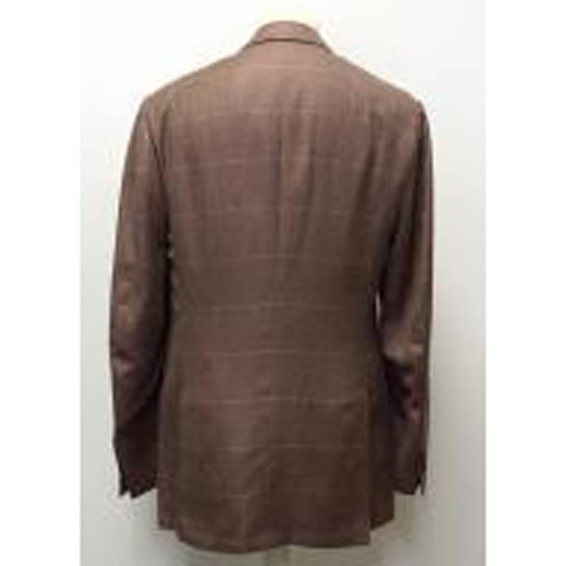 Kiton brown cashmere and linen check blazer in a single-breasted style with front flap pockets featuring a bright yellow lining. Made in Italy.

Condition: 10/10

* Please note, these items are pre-owned and may show signs of being stored even when