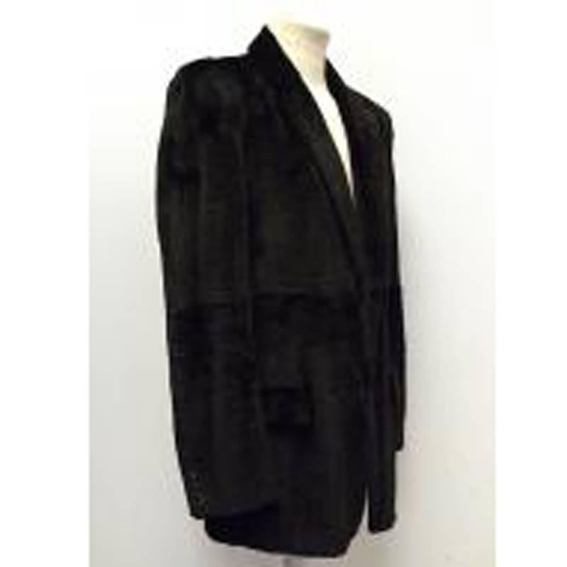 Gucci black fur coat in a single-breasted style with lapel and two button front fastening.

Size: L 
Measurements: Approx. Sleeve: 68cm Cuff: 16cm Chest: 56cm Shoulder: 48cm Length: 81cm
Condition: 10/10

* Please note, these items are pre-owned and
