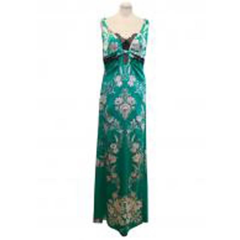 Roberto Cavalli green floral maxi dress in a sleeveless v-neck slip style featuring an all-over gold metallic print with black lace trim detail.

Size: US 10, L
Measurements: Approx: Bust - 41cm Waist - 38cm Hip - 52cm Length - 163cm
Condition: