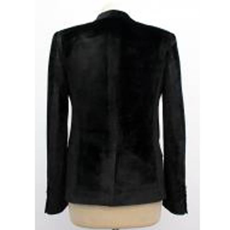 Saint Laurent black velvet blazer featuring padded shoulders and a single front button closure. Made in Italy. This item belongs to Caroline Stanbury of 