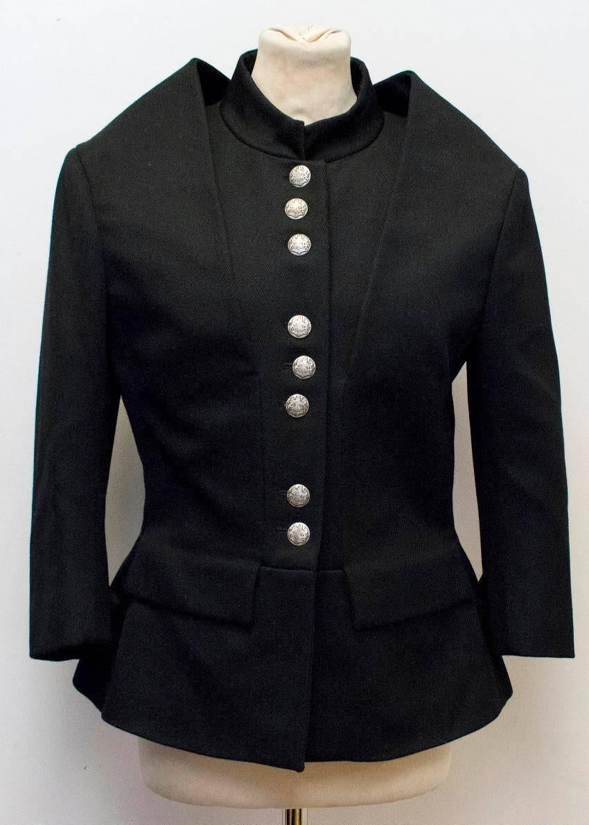 Alexander McQueen black military style jacket crafted in wool in a military style design with mandarin collar and silver-tone metal hardware.

Size: US 8
Measurements: Approx. Sleeve: 41.5cm Bust: 45cm Length: 65cm
Condition: 9/10

* Please note