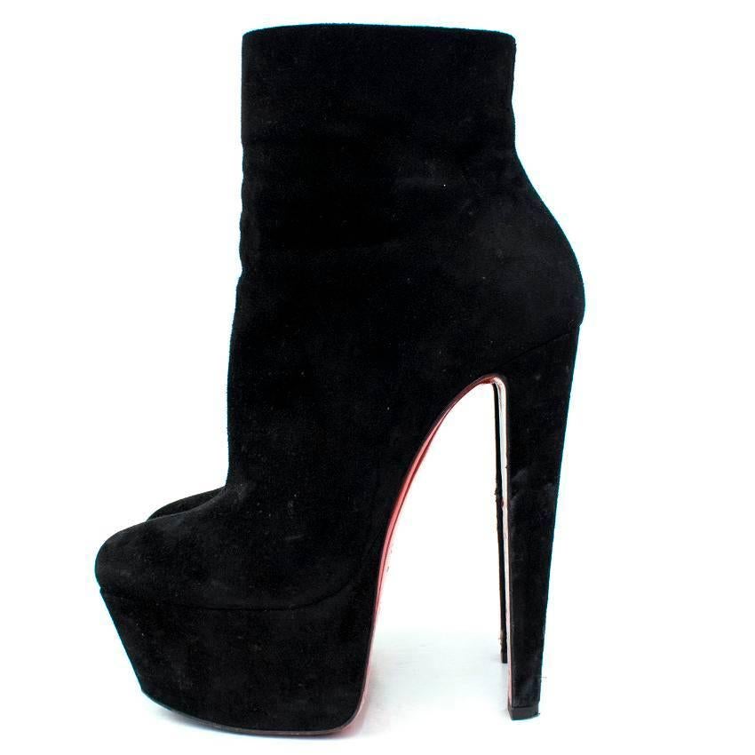 Christian Louboutin Black Fierce Suede Platform Boots

Features inner ankle zip and signature Louboutin red soles. 

Condition - 8.5/10.

Please note, these items are pre-owned and may show signs of being stored even when unworn and unused. This is