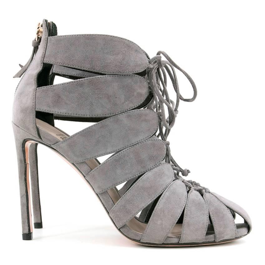 Francesco Russo grey lace-up cutout heels. Adjustable tie. Zip closure with gold detail. Round, closed toe. 

Condition: 9/10

Wear to the soles. 

Please note, these items are pre-owned and may show signs of being stored even when unworn and