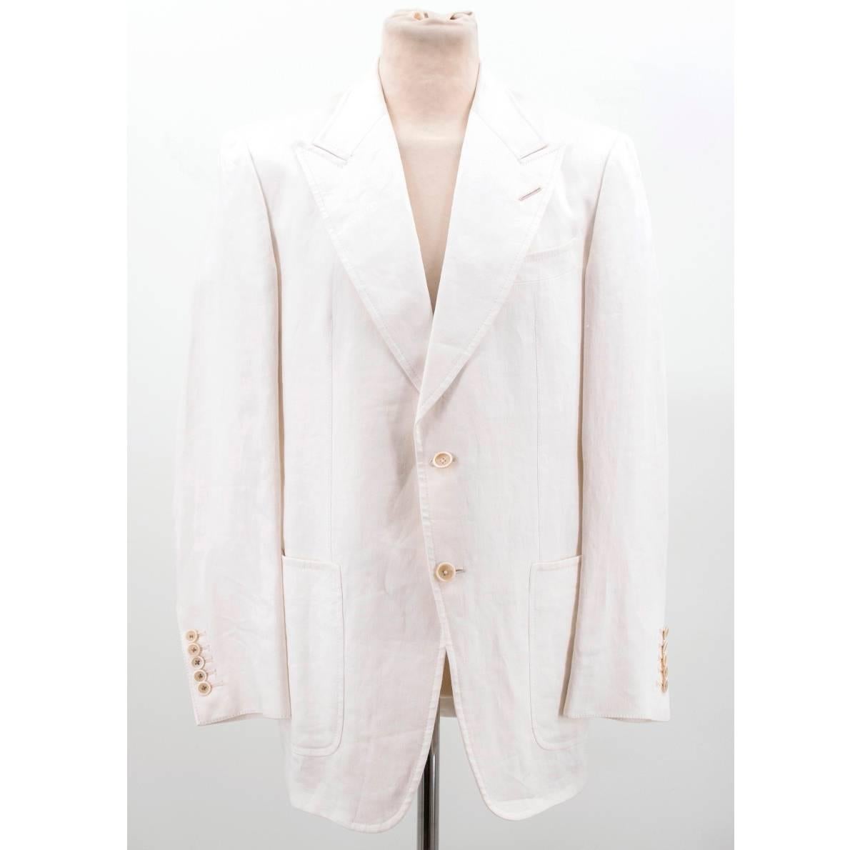 Tom Ford cream linen suit. A single-breast jacket with 2 front pockets and a chest pocket with a two button closure. The trousers are slim fit with turn-ups.

Size: L
Measurements: Approx: Jacket: Chest - 57cm Sleeve - 47cm Length - 81cm. Trousers: