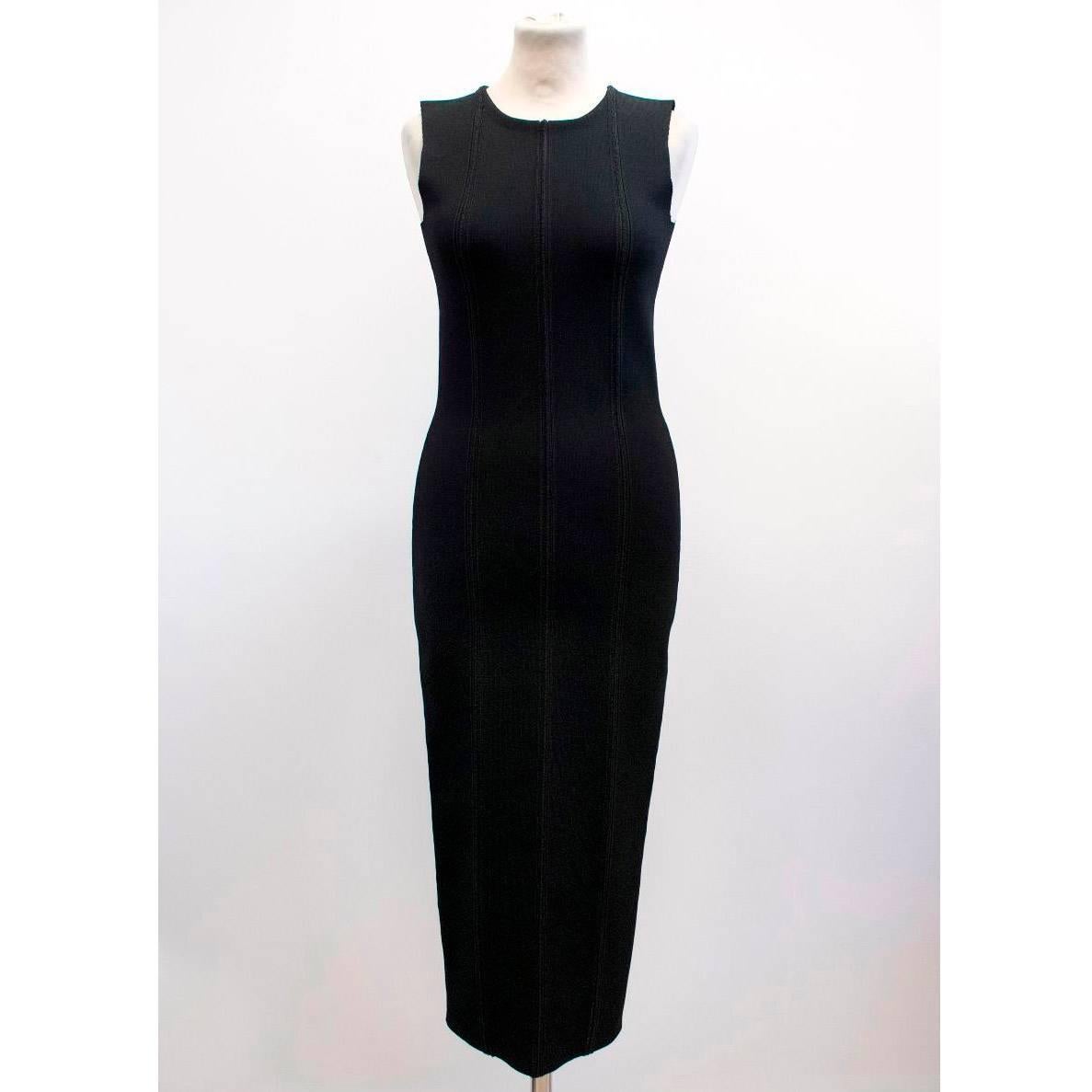 Victoria Beckham black midi dress in fitted sleeveless style featuring a decorative centre back exposed zip.

Size: US 0-2
Measurements: Approx. Bust: 36cm Waist: 34cm Length: 119cm
Condition: 10/10 

* Please note, these items are pre-owned and may