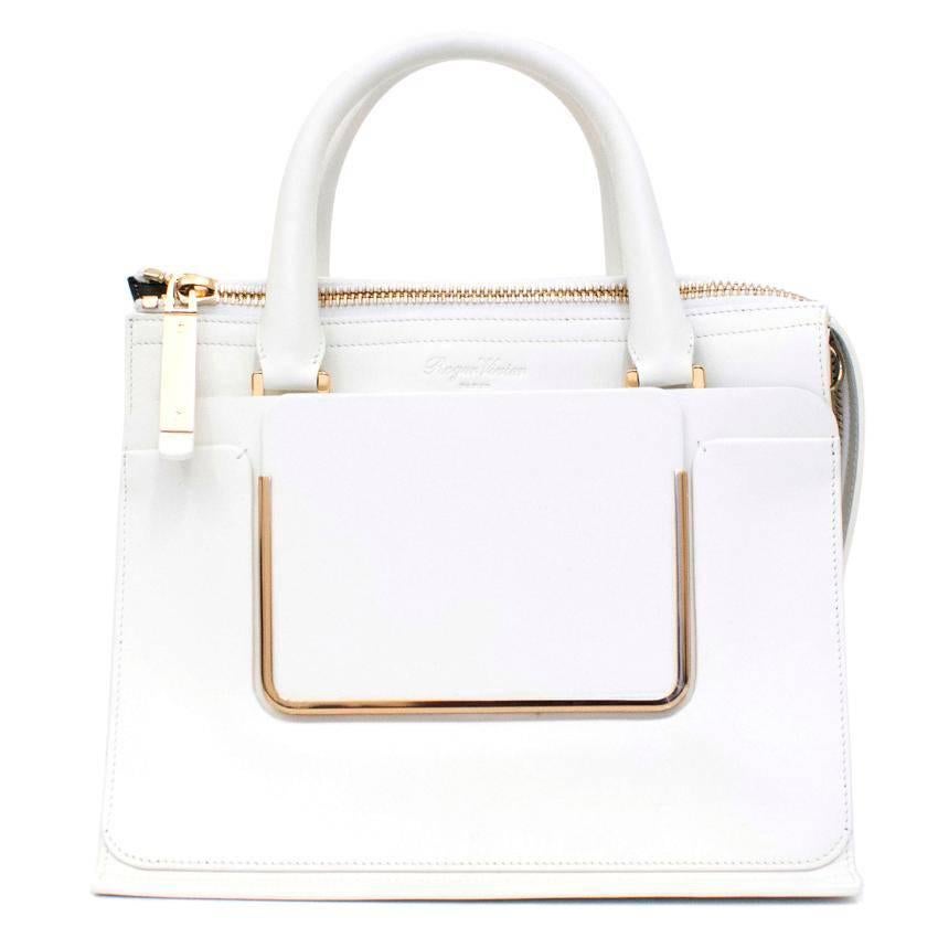 Roger Vivier square white shoulder bag, with adjustable strap. This item features gold hardware with zip closure and two inside pockets.

Measurements: Approx. Width: 27cm Length: 23cm
Condition: 10/10

* Please note, these items are pre-owned and