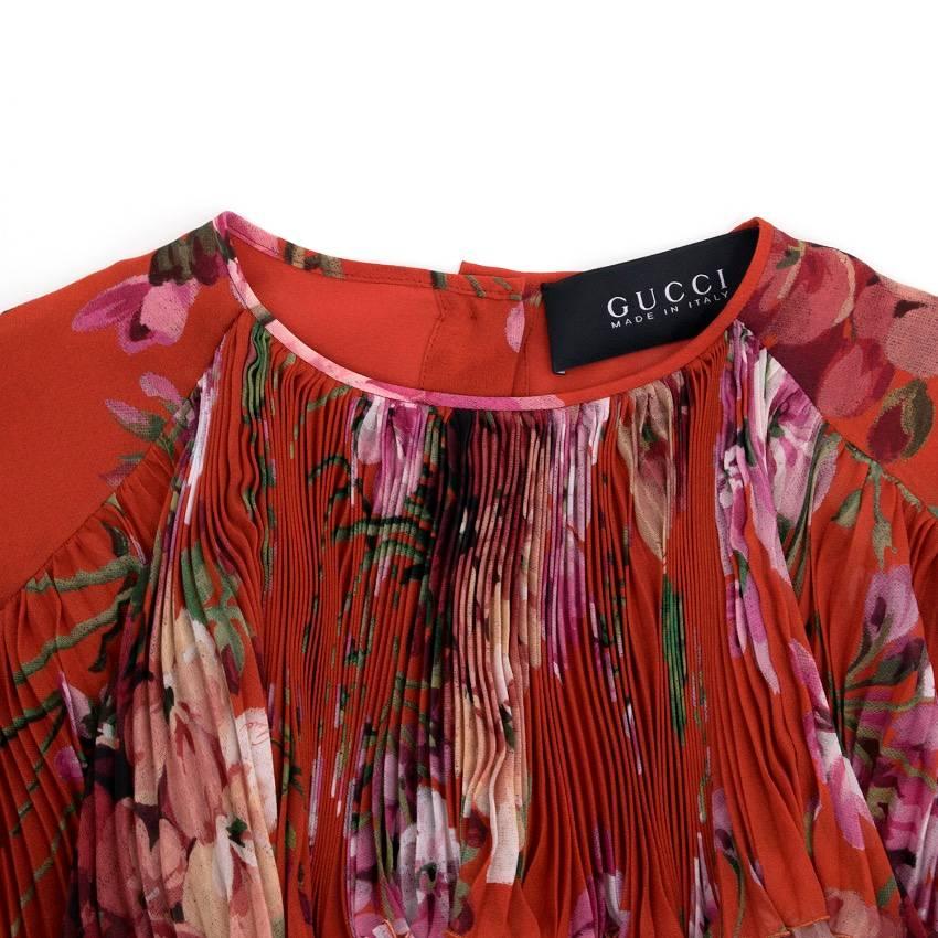 Gucci red floral silk mini dress crafted in georgette in a loose-fitting, long-sleeved round neck style with pleated ruffle detail. 

Size: US 6
Measurements: Approx. Shoulder: 38cm Sleeve: 60cm Length: 90cm
Condition: 10/10

* Please note, these