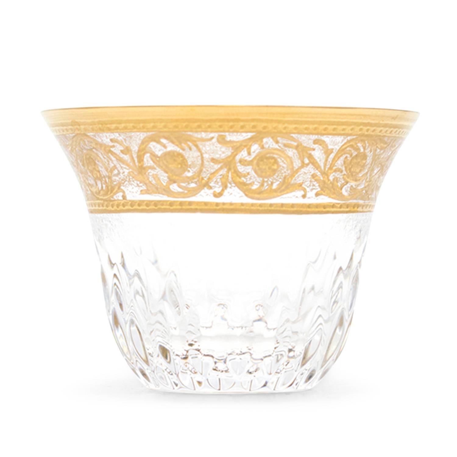 Hermes St. Louis Thistle set of six gold tea cups. 

Set of six crystal mini tea cups with hand-painted gold detailing. 

Measurements	Approx. Diameter: 4.8 Cm Height: 4.3 Cm

Condition - 10/10
Storage marks on box.
